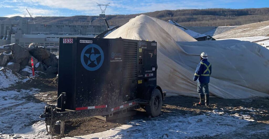 Portable industrial generator used for construction and power needs at a job site.